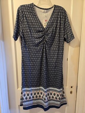 Upbeat Navy Blue V-Neck Midi Dress with Gathered Front and Printed Hem